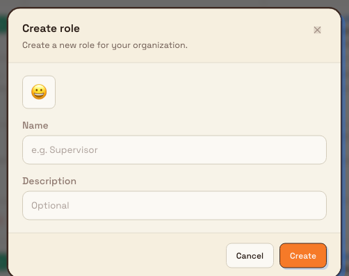 The Create role dialog with fields for an emoji, a name, and a description.