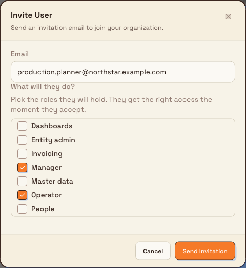 Invite User dialog with a production planner email and the Manager and Operator roles selected.