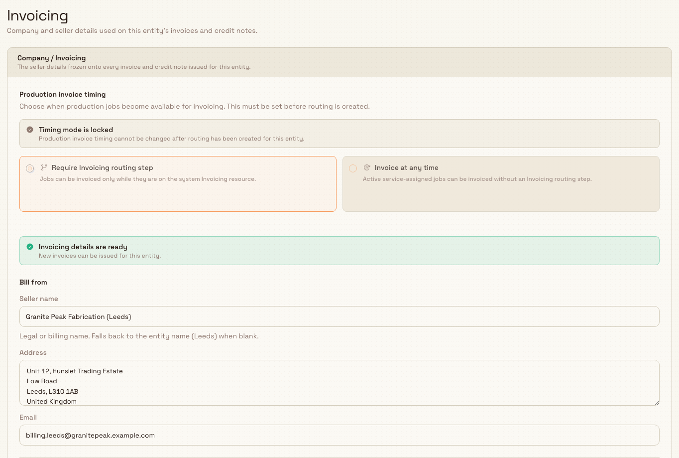 Invoicing settings page showing the Company / Invoicing card with production invoice timing options and Bill from fields.