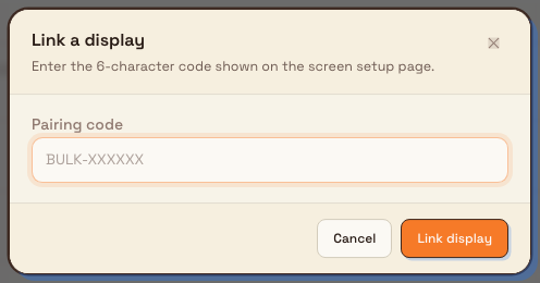 The Link a display dialog prompting for the six-character pairing code shown on a screen.