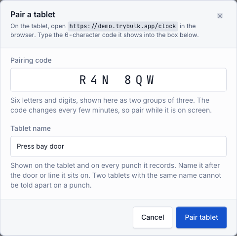 The Pair a tablet dialog with a pairing code and a tablet name.