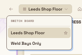 Header board picker dropdown listing two boards, with a star on the default board and a check mark on the selected board.
