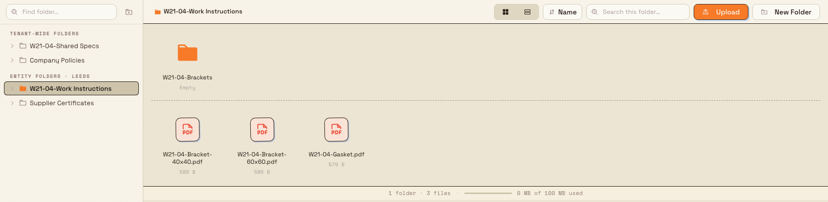 The Files area showing the folder sidebar with tenant-wide and entity folder sections, a grid of file tiles, the toolbar, and the bottom status strip.