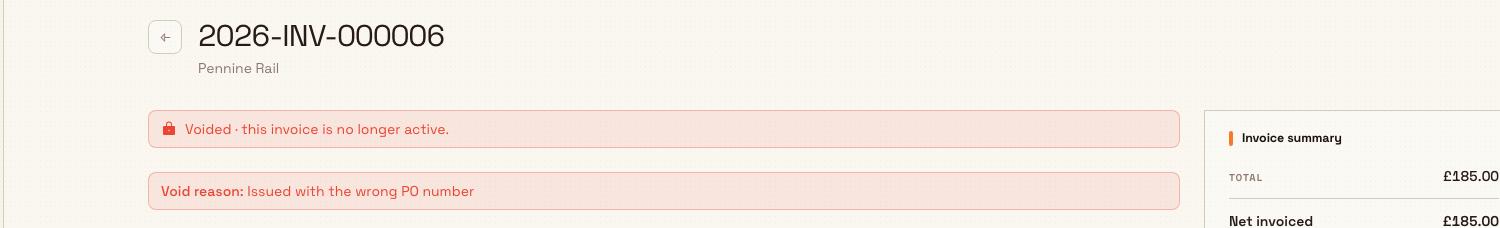 A voided invoice showing the Voided badge, a lock banner stating the invoice is no longer active, and the recorded void reason.
