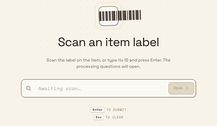 The Scan and Process opening screen with a barcode graphic, the heading Scan an item label, and an input field awaiting a scan.