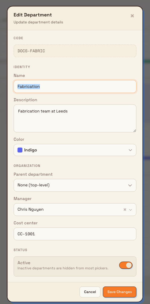 Edit Department dialog with a disabled Code field at the top and an Active toggle in a Status section at the bottom.