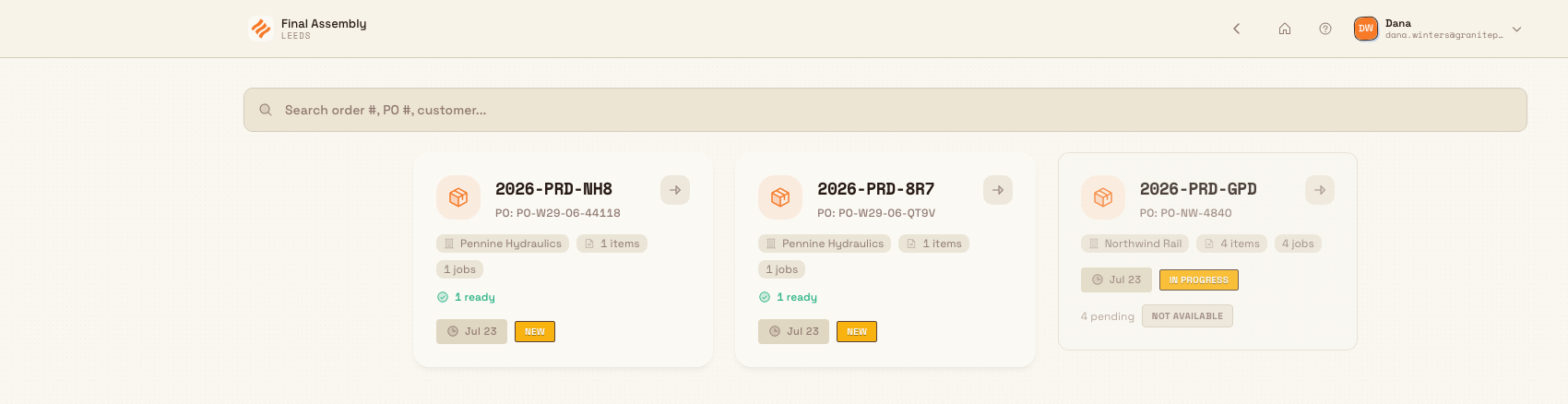 Load Order screen showing a header with the workstation name, a search bar, and a grid of order cards with status, job-progress, and due-date chips.