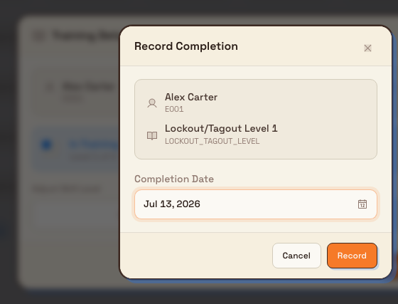 The Record Completion dialog showing an employee and program summary and a Completion Date field, ready to log a training completion.